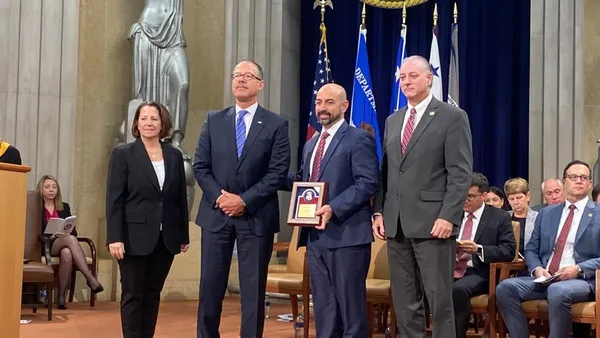Max J. Pérez-Bouret at the Executive Office Director's Award Ceremony